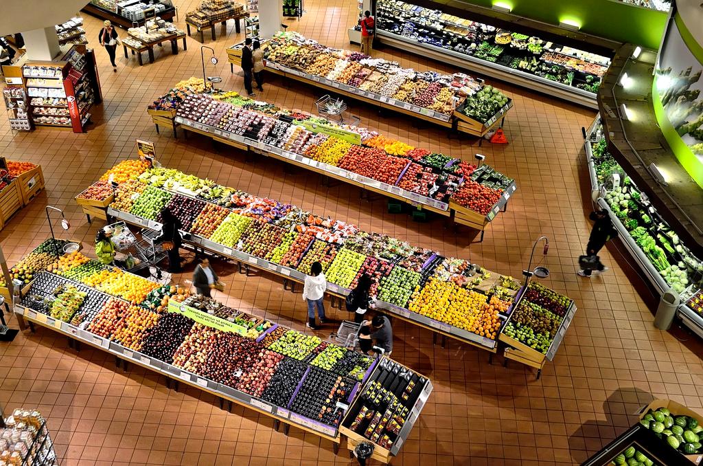 Shopping basket full of groceries and a savings calculator